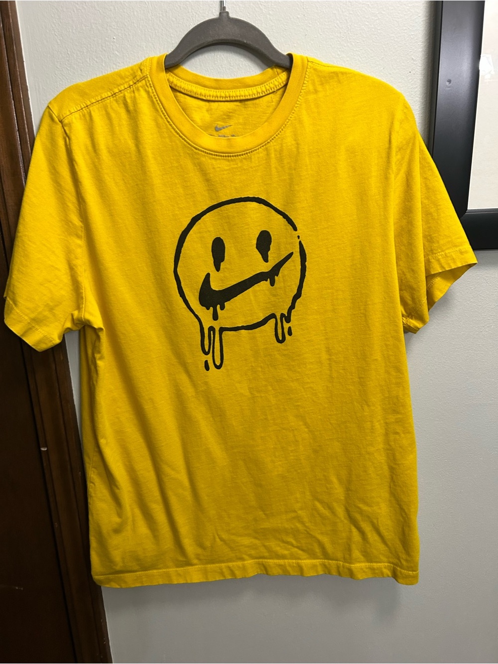 Nike Yellow Short-Sleeve Tee with Black Drip Smiley Graphic